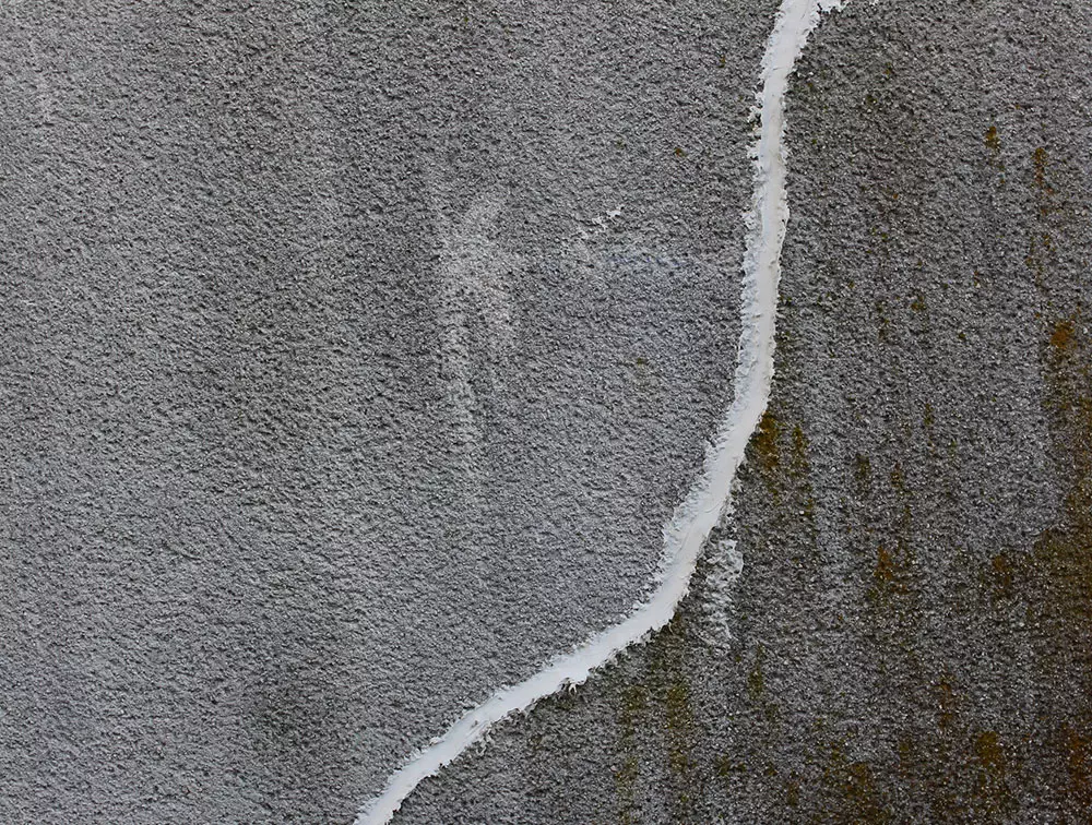 photo of a cracked concrete surface repaired by ESS in Edmonton