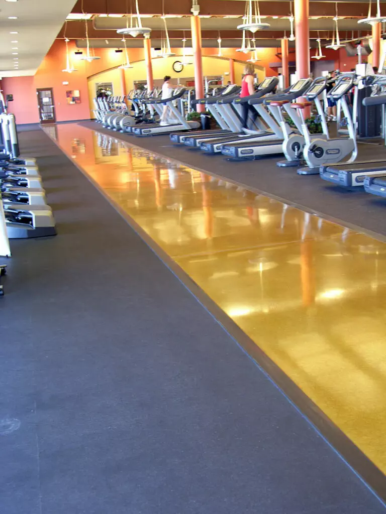 photo of an excersize facility with a beautiful concrete surface dyed and polished