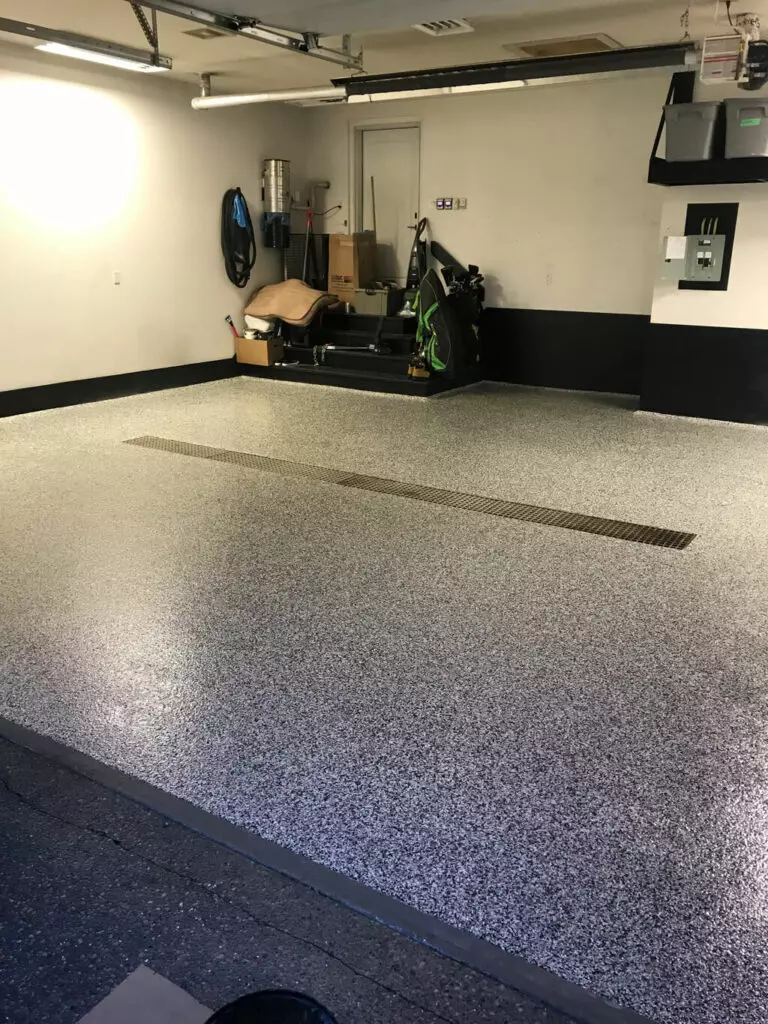 photo of a decoflake and epoxy floor in a residential garage